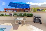 Your private rooftop area with plunge pool, patio tables, lounge chairs and BBQ